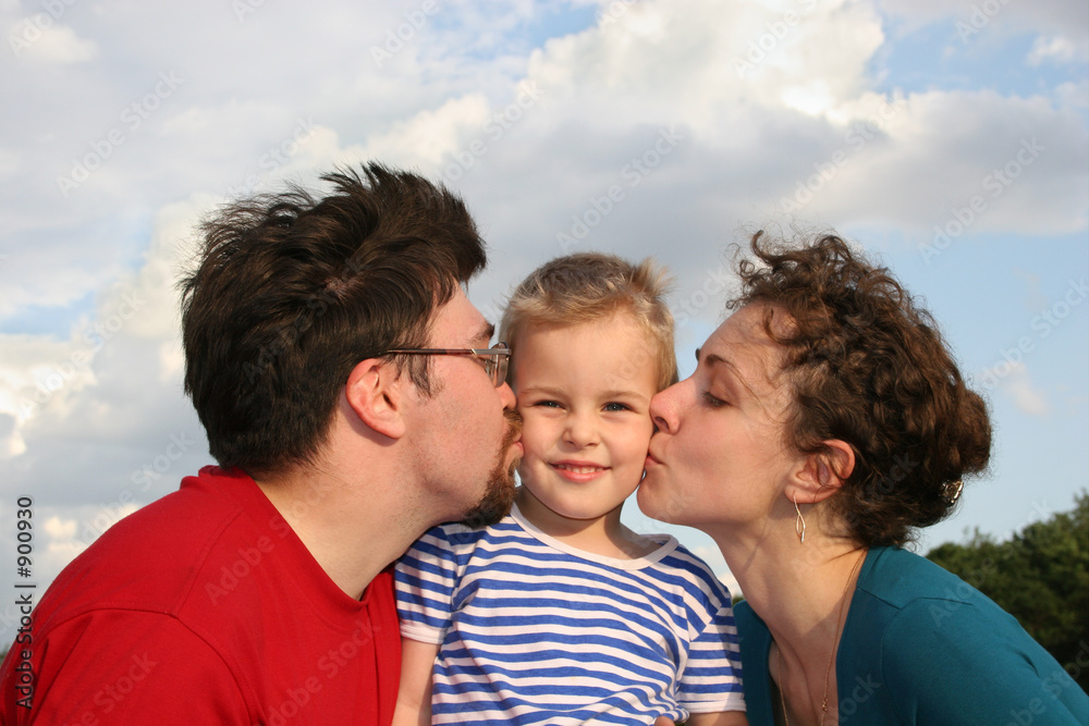 Fototapeta premium parents kiss son