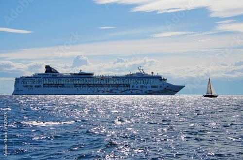 cruise liner and a small yacht