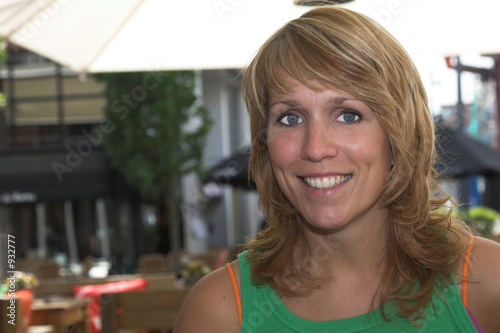 pretty blond woman on a terrace