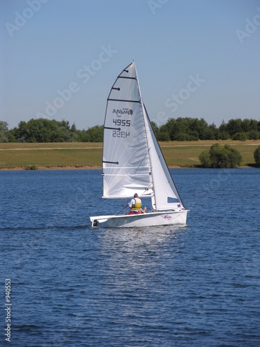 sailing dinghy in full sail