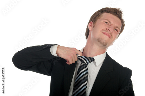 businessman loosening his tie photo