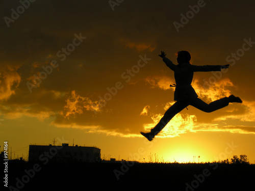 jump girl sunset