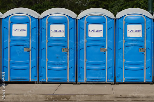portable toilets with gereric signage
