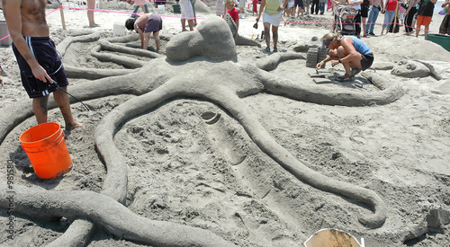 sand sculpture of an octopius photo