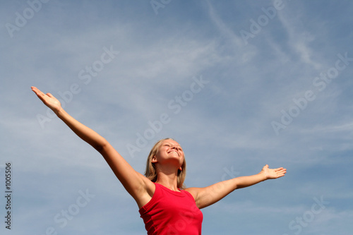 happy woman with her arms wide open