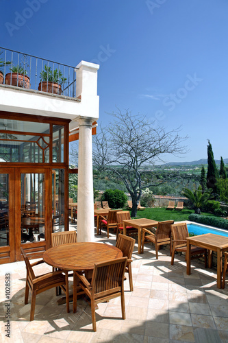 luxury rustic hotel and swimming pool in countryside