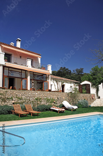 luxury rustic hotel and swimming pool in countryside
