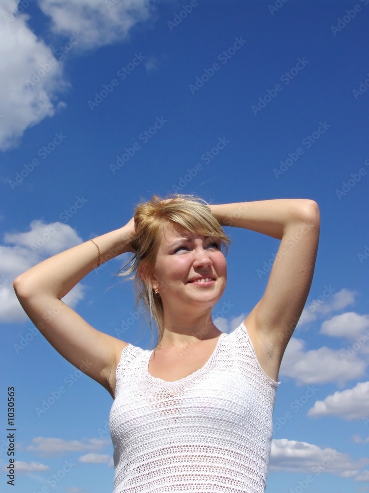 the girl on background on blue sky the girl on background on blue sky
