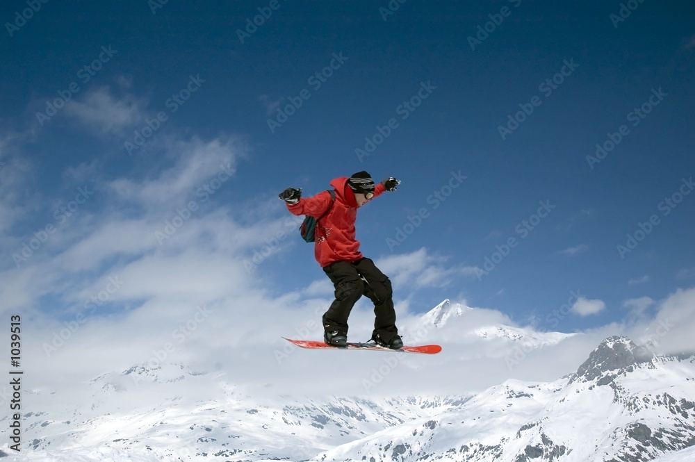 snowboarder jumping high in the air