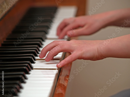 girl playing piano
