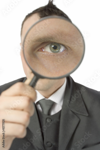 businessman with magnifying glass
