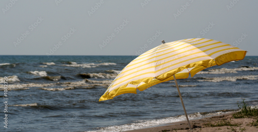 yellow beach umbrella panorama