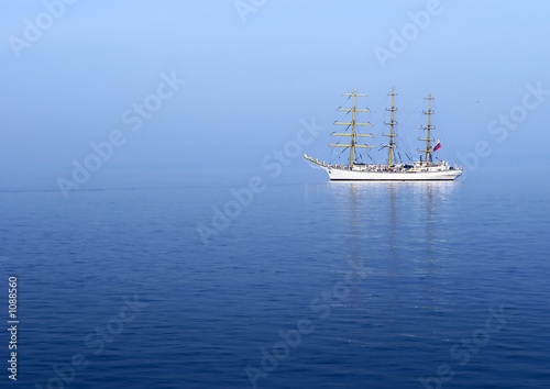 sail ship in the morning mist