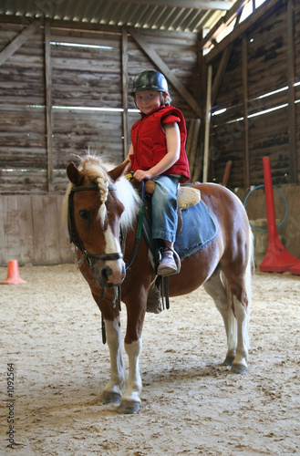 young girl on pony