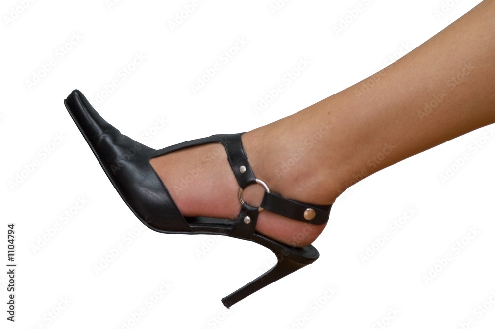 female foot in shoe isolated on white background female foot in shoe isolated on white background