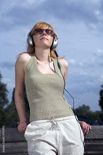 woman listening to music outdoor