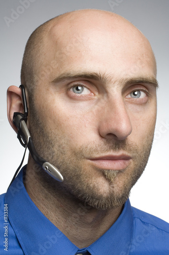 detail of man with phone headset photo