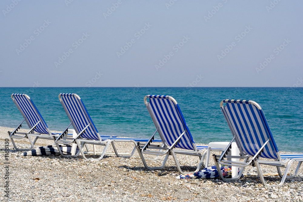 four beach chairs