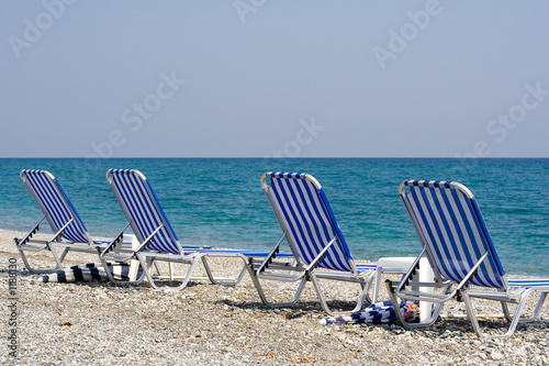four beach chairs © Georgios Alexandris
