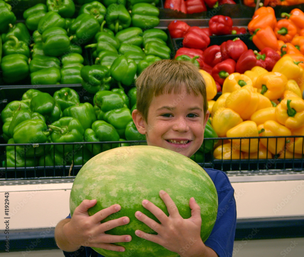 Fototapeta premium boy holding watermelon