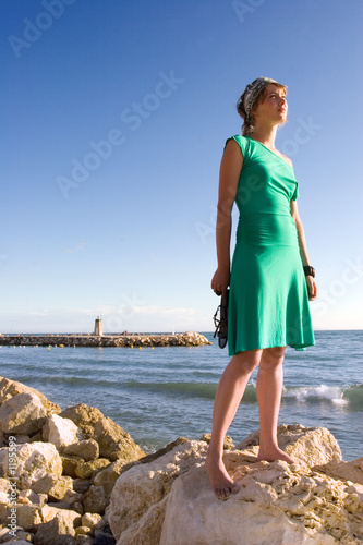 woman looking out at beach photo