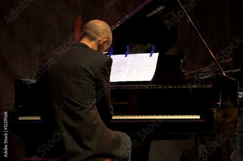 Fototapeta pianist playing piano