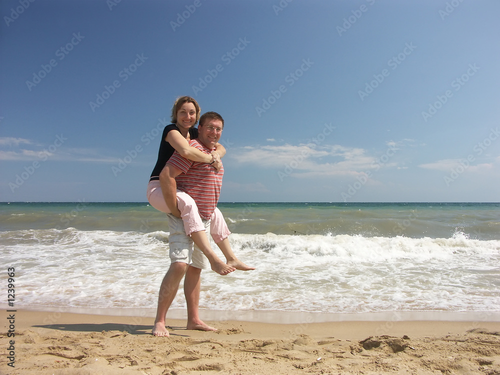 happy couple on the beach