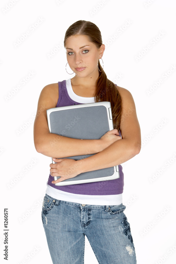 young woman in puple tank top hugging laptop young woman in puple tank top hugging laptop