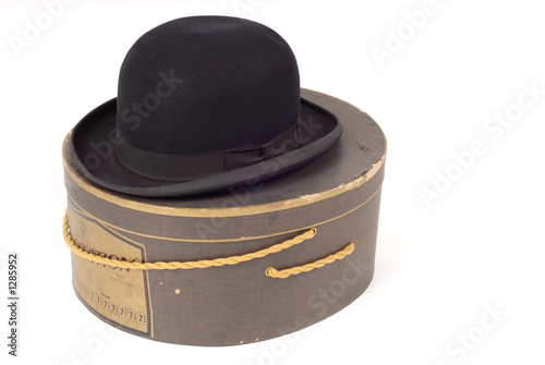 old derby hat resting on hatbox