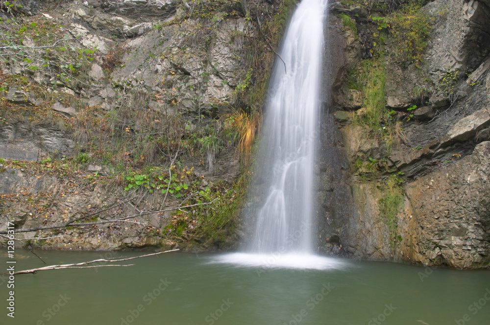 brook waterfall and rocks