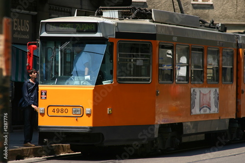 orange street car trolley milan, itlay