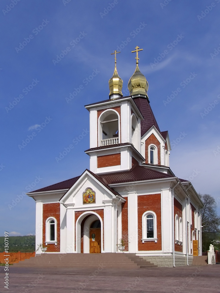 Orthodox church with golden domes and crosses