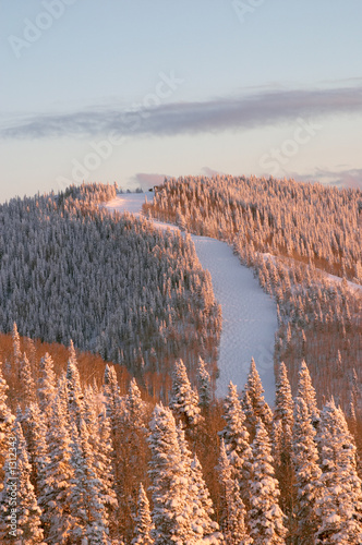 sunset on ski slopes at winter, steamboat