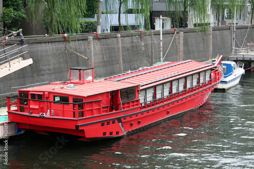red wooden boat