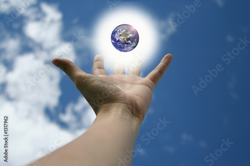 hand and earth