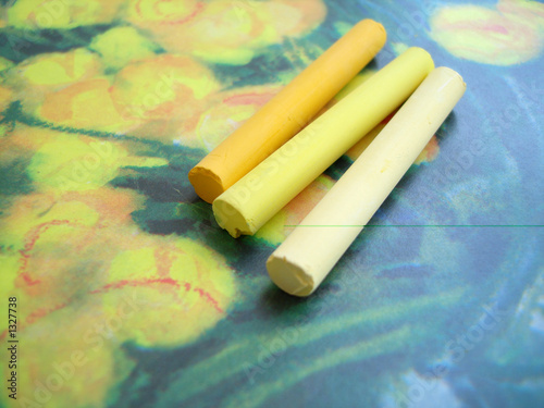 set of yellow crayon on a picture