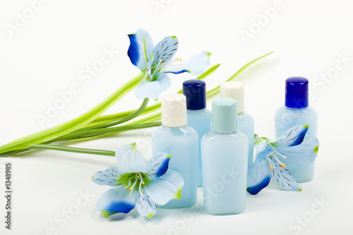 blue composition: cosmetics with flower photo