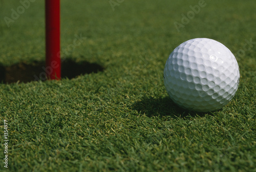 golf ball on golf course grass