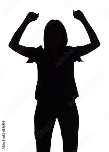 silhouette of woman with arms up