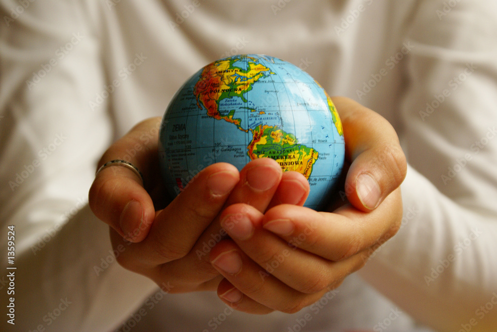 hands with globe hands with globe
