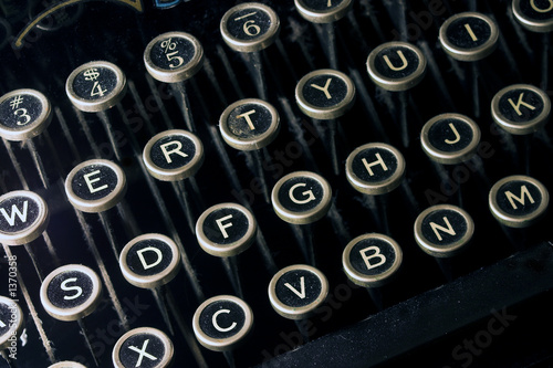 old dusty black typewriter keyboard