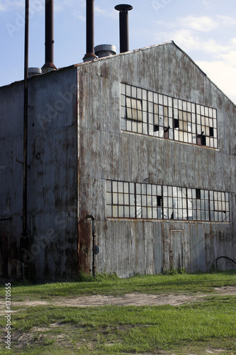 abandoned factory building and chimney