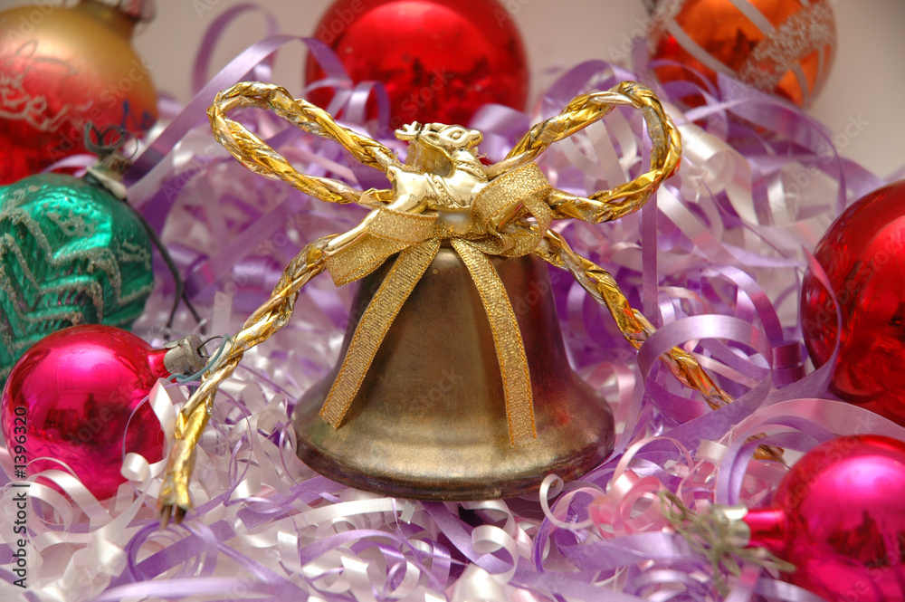 various chrismas decorations and golden bell