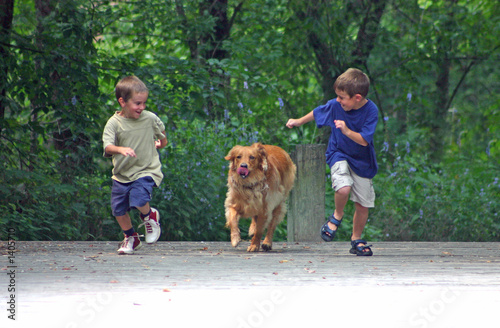 Canvas Print boy racing dog