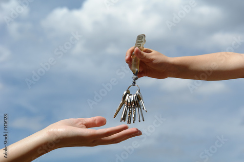 child's hand with keys