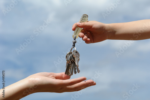 child's hand with keys