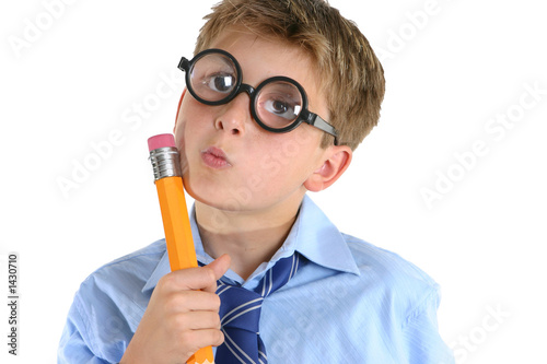 comical boy holding a pencil and thinking