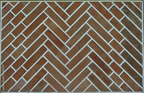 red brickwork in herringbone pattern