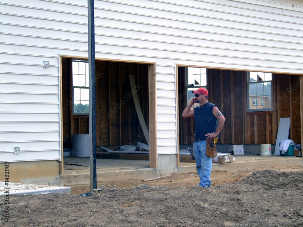 construction worker on cell phone