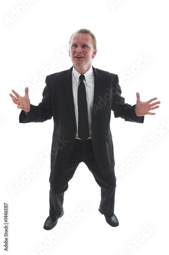 stock photo of expansive man in black suit photo